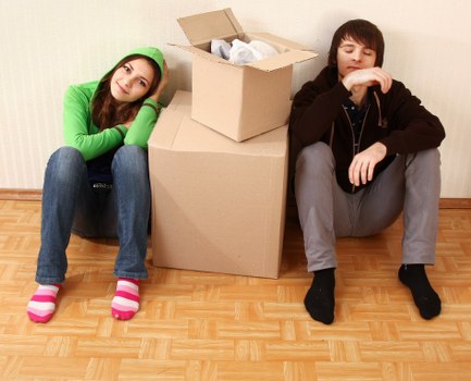 Professional moving team handling furniture in a Pimlico apartment building