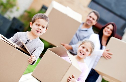 Moving team handling items carefully during a house removal