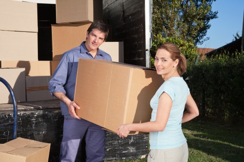 Team protecting floors and doorways during a property move